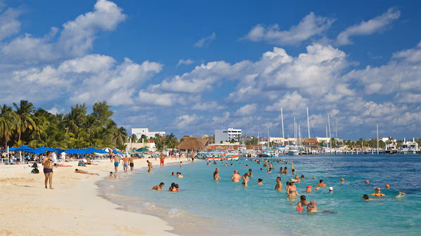 North Beach near Zoëtry Villa Rolandi Isla Mujeres with powdery white sand and clear shallow Caribbean waters